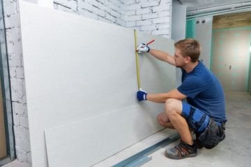 DIY drywall installation in Sydney - measuring drywall sheets